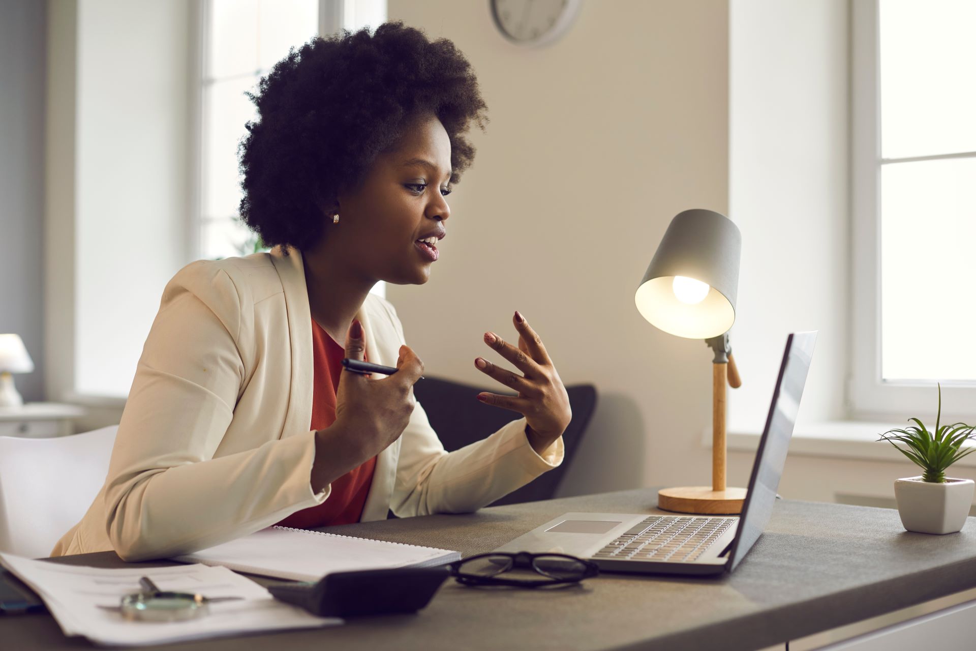 Woman virtually attending the African American Conference