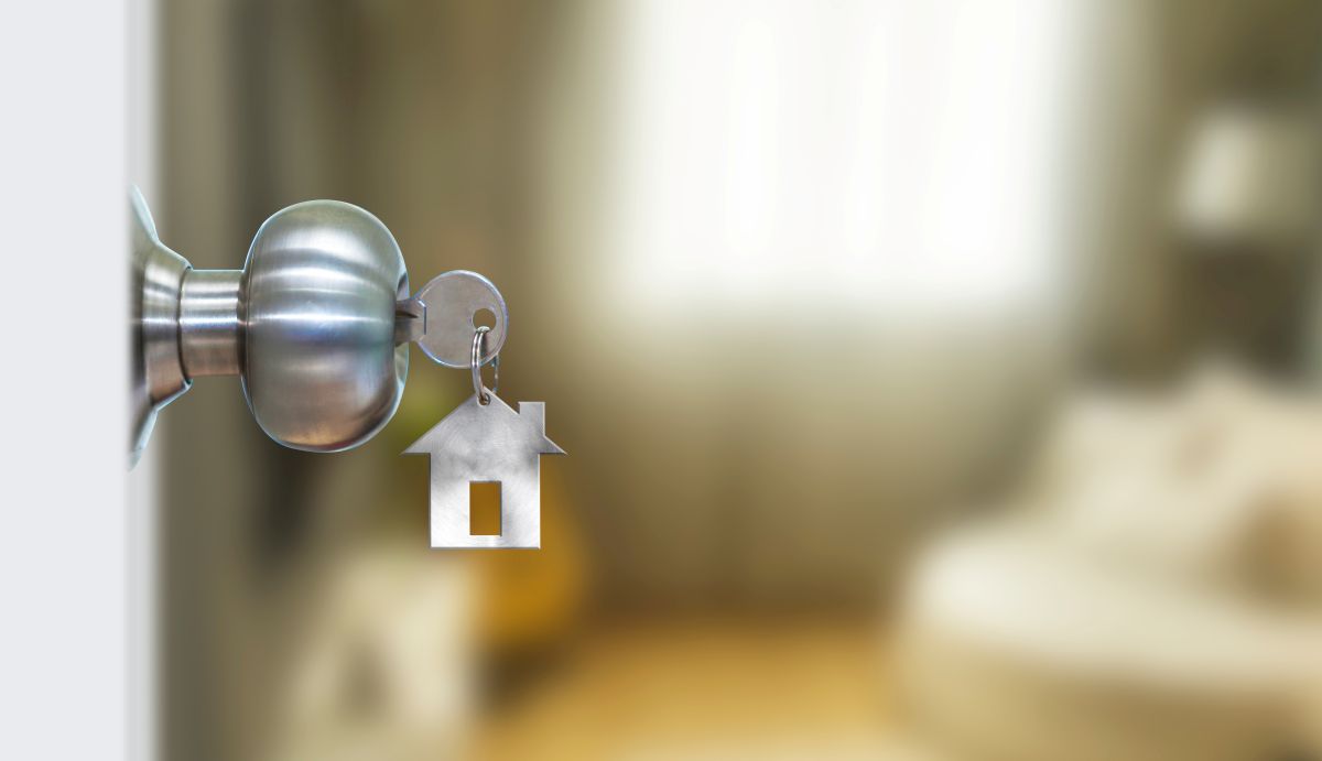 Front door with keys in the door knob.