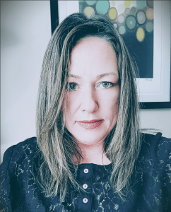 headshot of Kelly Carbello