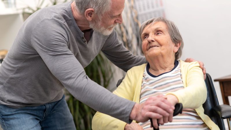 Man takes care of aging parent