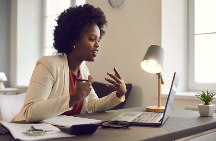 Woman virtually attending the African American Conference